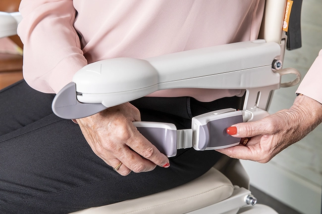 Photo of Lady Fastening Seat Belt on Stairlift